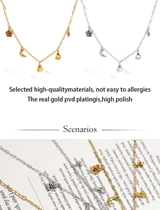 Detail of gold and silver plated necklaces with floral, moon, and penguin pendants