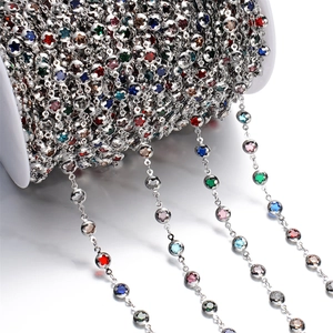 Macro shot of silver plated DIY jewelry chain with multi-color crystal gemstones