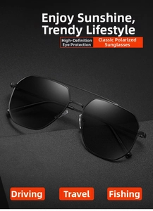 Close-up of polarized pilot sunglasses with black metal frame and dark lenses