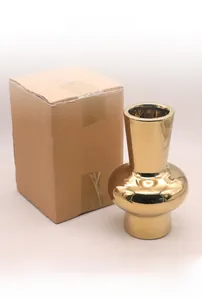 Detail view of corrugated cardboard packaging for silver luxury ceramic vases in two sizes
