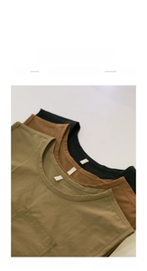 Close-up of lightweight waterproof art aprons in khaki, brown, and black textures