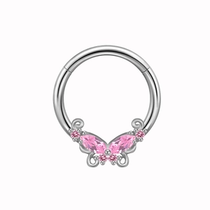 Detailed view of silver butterfly nipple ring with pink marquise and round gemstones
