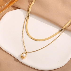 Double-layered gold titanium steel necklace with irregular pearl pendant on silk base