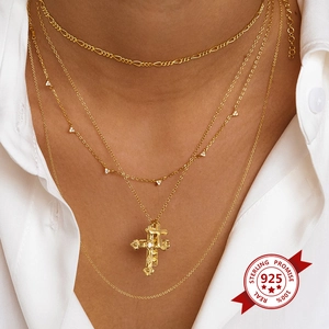 S925 sterling silver multi-layered cross necklace with golden finish worn by model