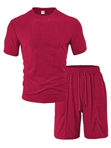 Close-up of wine red men's sportswear set showing premium waffle embossed fabric texture