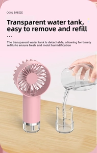Detail of pink misting fan showing how to refill the detachable transparent water tank