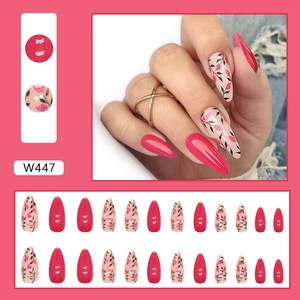 Hot pink almond press-on nails with delicate floral patterns and glossy solid finish