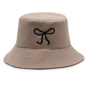 Women's khaki cotton bucket hat with black bow embroidery for stylish sun protection