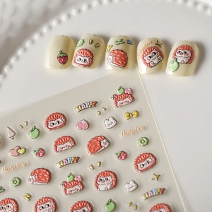 3D embossed hedgehog nail stickers with fruit and heart patterns on ceramic plate