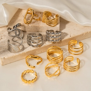 Minimalist gold and silver stainless steel rings in geometric and textured designs