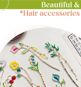 Detailed close-up of vintage style floral hair pins with tassels and enamel finish