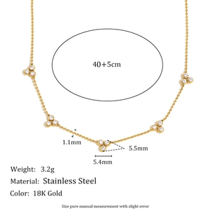 Detail of 18K gold plated stainless steel necklace with sparkling zircon droplets