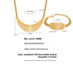 Detailed view of gold plated fence link necklace and bracelet set with cubic zirconia