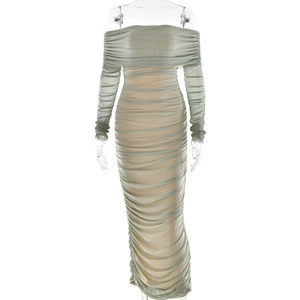 Detail showing the sheer mesh fabric and ruching design of the sage green bodycon dress