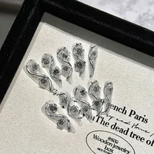 Gothic 3D silver vine and black rose press-on nails with silver glitter background