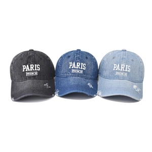 Washed denim baseball caps with Paris embroidery in black, dark blue, and light blue shades