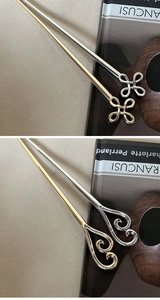 Close-up of gold and silver alloy hairpins featuring minimalist knot and heart designs