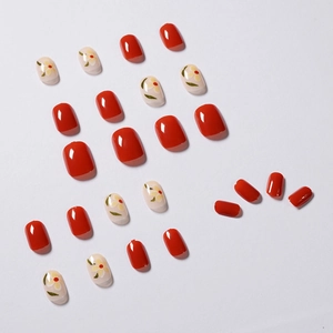 Short square press-on nails set with red gloss and yellow floral hand-painted designs