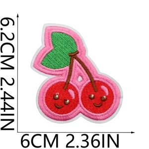 Close-up showing dimensions of cherry cartoon embroidered patch for jackets and bags