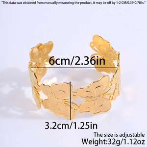 Detailed view of wide gold leaf cuff bracelet with adjustable open design measurements