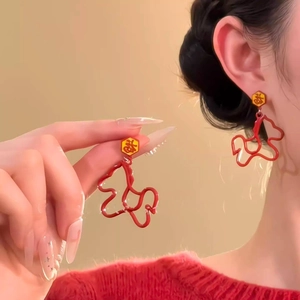 Red puppy drop earrings with golden Fu character stud, festive and elegant style
