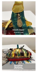 Detailed view of bohemian snakeskin texture bag with fringe trim and golden zipper