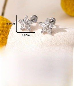 Detail view of silver star earrings with zirconium inlay and steel screw back dimensions