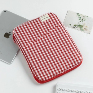 Red and white checkered 13-inch laptop sleeve with front pocket and zipper closure