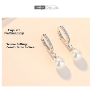 Detail of 925 sterling silver pearl earrings with paved stones and S925 hallmark