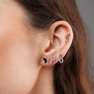 Silver earring set with snake, butterfly, and lightning bolt designs featuring zircons