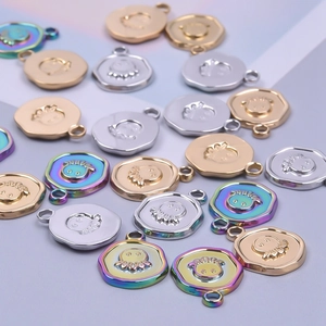 Mix of octopus charms in gold, silver, and rainbow finishes for DIY necklace jewelry