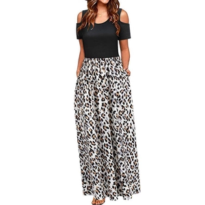Fashionable cold shoulder maxi dress with black top and leopard print skirt in round neck