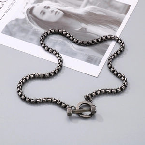 Vintage stainless steel barbell OT clasp necklace with square snake chain on a card