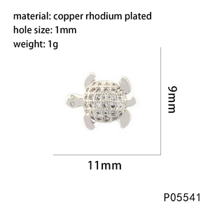 Detailed view of rhodium-plated turtle charm with white zircon and exact dimensions