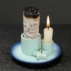 Ceramic incense burner set with gradient teal tray and sage bundle on dark stone
