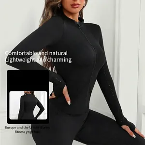 Slim fit black long sleeve yoga jacket with zipper, stand collar and thumb holes