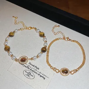 Ensemble de bracelets double couche en perles et pierres brunes de style vintage français