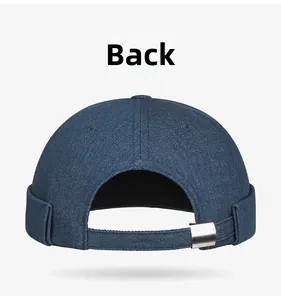 Detail view of the back of navy denim Miki hat featuring an adjustable silver metal buckle