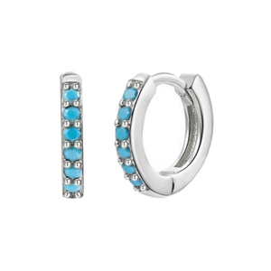 Macro detail of S925 silver huggie earrings featuring multiple round turquoise stones
