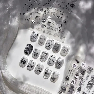 Embossed 3D nail art stickers featuring cute hand-drawn black cats and musical notes