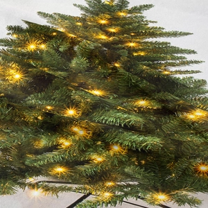 Detail view of the fine polyester fabric texture with Christmas tree light print