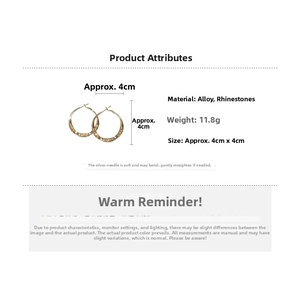 Detailed specs of twisted gold hoop earrings with rhinestones, 4cm size and 11.8g weight