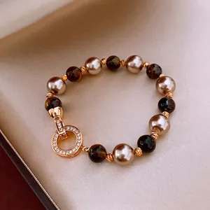 Beaded tiger eye and pearl necklace with gold-plated zircon clasp in jewelry box