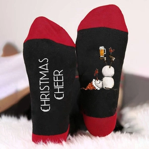 Christmas socks with red and black color block, featuring snowman print and holiday letters