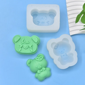 Cute bear shaped silicone mold for DIY soap resin candles on light blue backdrop