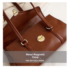 Nahaufnahme der karamellfarbenen Ledertasche mit hochwertigem Magnetverschluss aus Gold-Metall