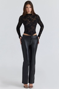 Detailed view of the slim fit black lace corset top with elegant sheer boning design