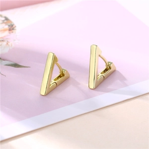 Minimalist 18K gold triangular hoop earrings with polished geometric metal finish