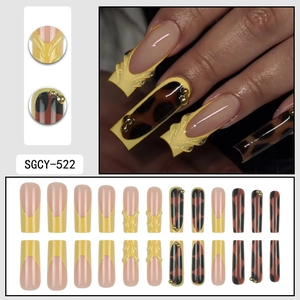 3D French press-on nails with leopard print, yellow tips, and gold bead accents