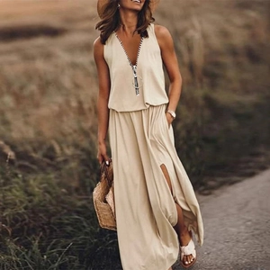 Detail of beige sleeveless maxi dress with V-neck zipper and stylish high slit design